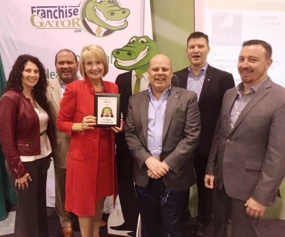 FASTSIGNS receives the Franchise Gator award for: The Top 10 Franchise Award